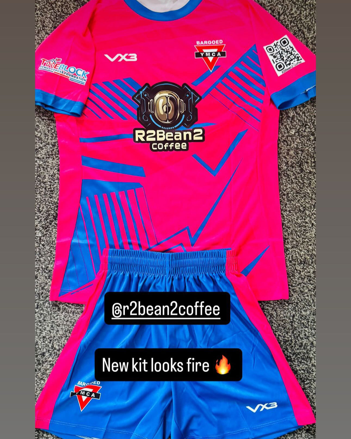The Boygoid YMCA Under-11s football team kit, proudly sponsored by R2BEAN2 Coffee, is displayed ready for the season. The image celebrates community support, grassroots football, and investing in young players.